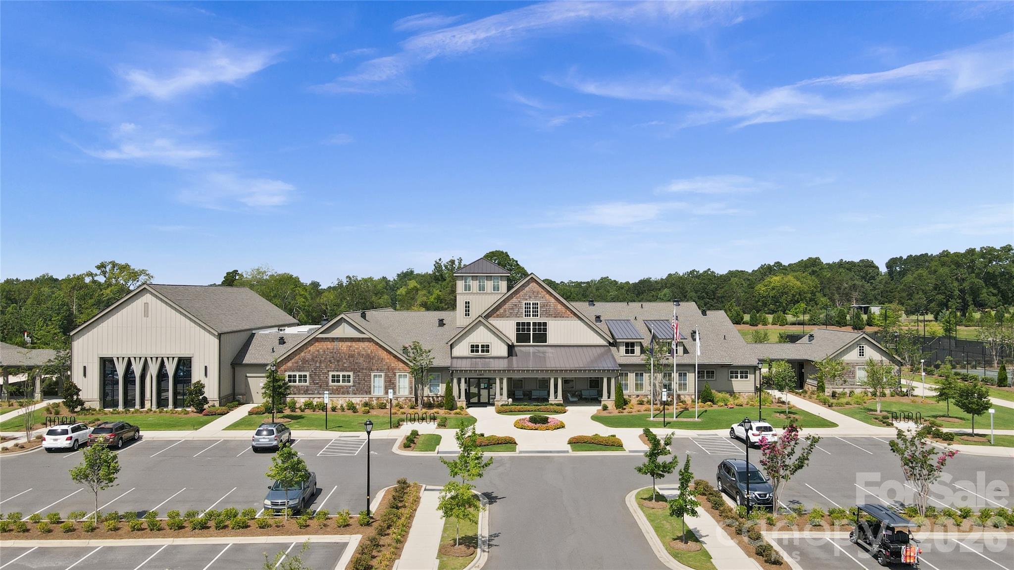 952 Kirby Drive Fort Mill, SC 29715 - Photo 40 of 42 a view of a big house with a big yard and large trees