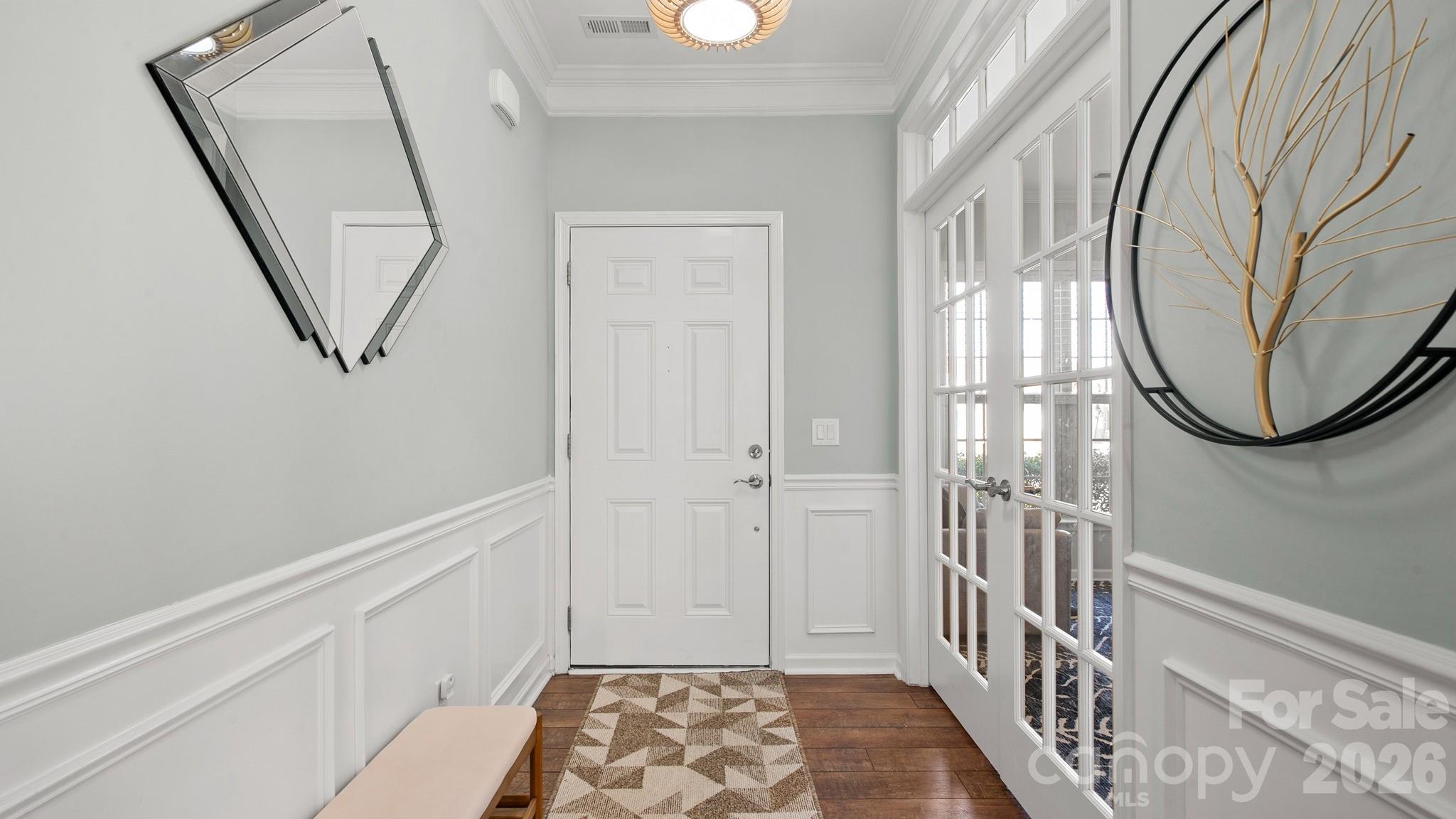 952 Kirby Drive Fort Mill, SC 29715 - Photo 6 of 42 a view of a hallway with wooden floor and entryway