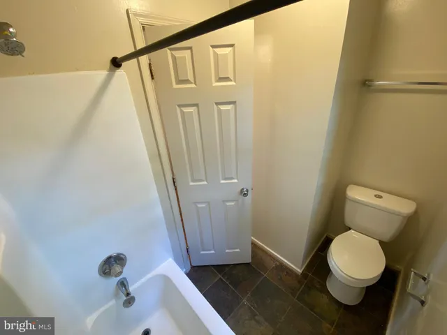 a bathroom with a sink and a tub