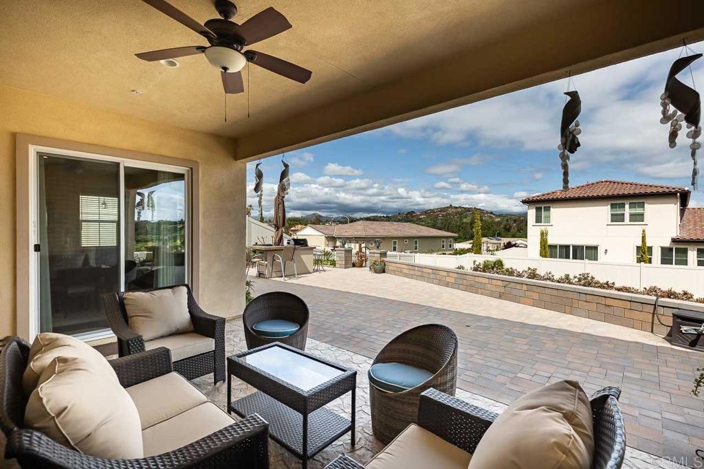 1194 Palomar Circle Escondido, CA 92027 - Photo 26 of 37 a living room with furniture and a large window