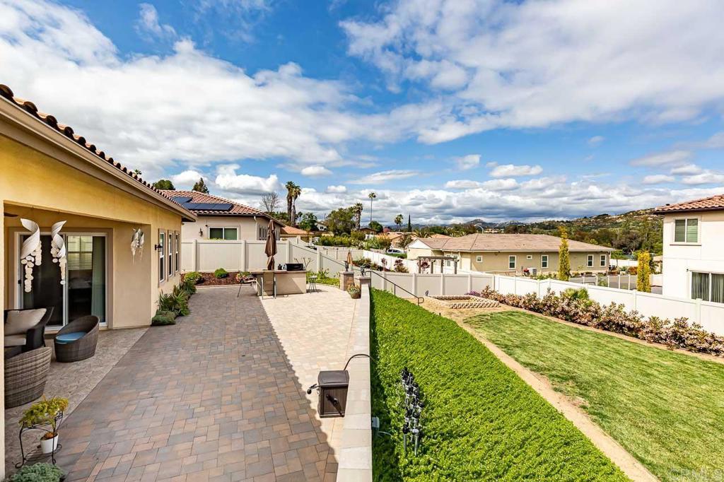 1194 Palomar Circle Escondido, CA 92027 - Photo 28 of 37 a view of a swimming pool with a lounge chairs