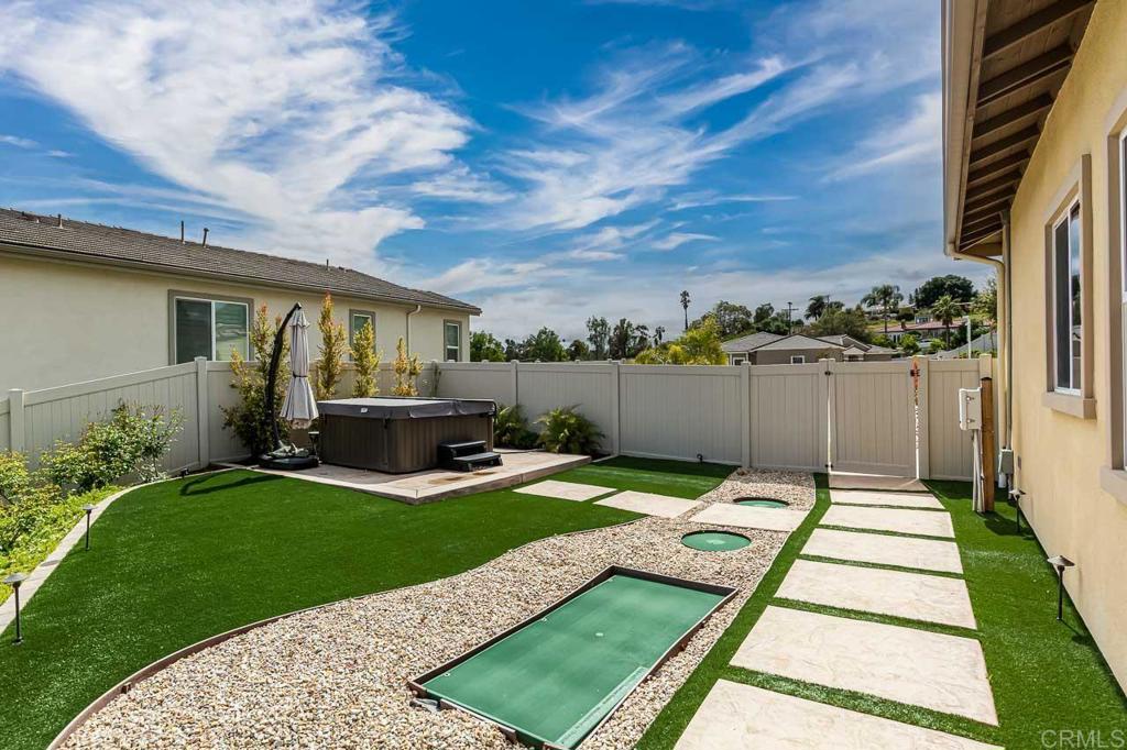 1194 Palomar Circle Escondido, CA 92027 - Photo 30 of 37 a view of a backyard with sitting area