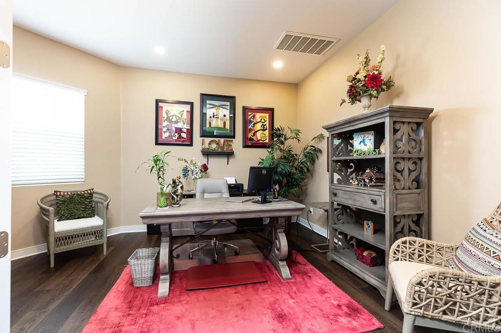 1194 Palomar Circle Escondido, CA 92027 - Photo 9 of 37 a living room with furniture and a fireplace