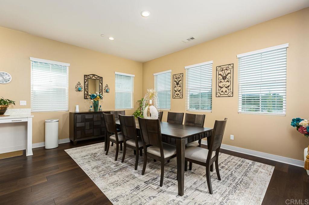 1194 Palomar Circle Escondido, CA 92027 - Photo 10 of 37 a view of a dining room with furniture