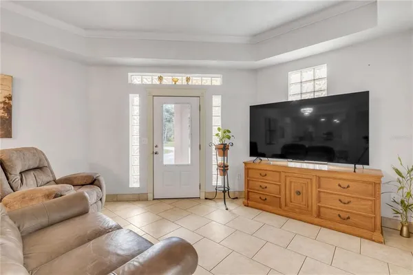 a kitchen with stainless steel appliances granite countertop a refrigerator a stove and a sink