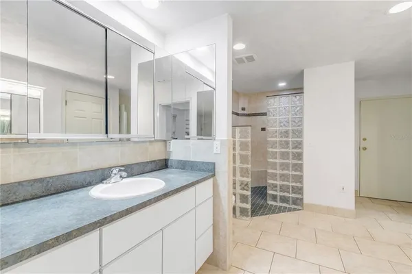 a house with swimming pool in front of it