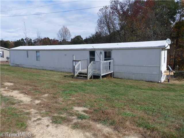 436 Rat Castle Road Pelham, NC 27311 - Photo 1 of 7 Exterior Front.