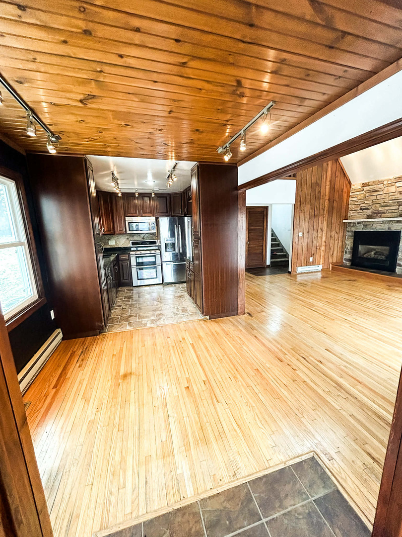 2211 613th Avenue Sabula, IA 52070 - Photo 14 of 45 a view of a hall with wooden floor