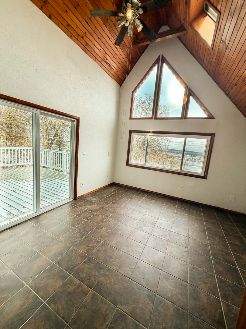 2211 613th Avenue Sabula, IA 52070 - Photo 15 of 45 a view of an empty room with a window