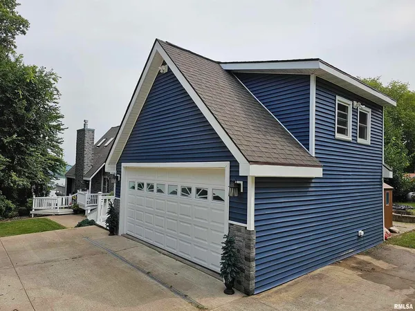 a view of a house with a garage