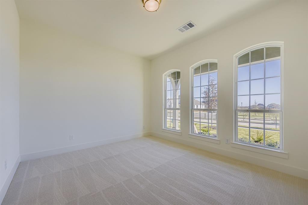1906 M3 Ranch Road Mansfield, TX 76063 - Photo 19 of 29 Empty room with light colored carpet and baseboards