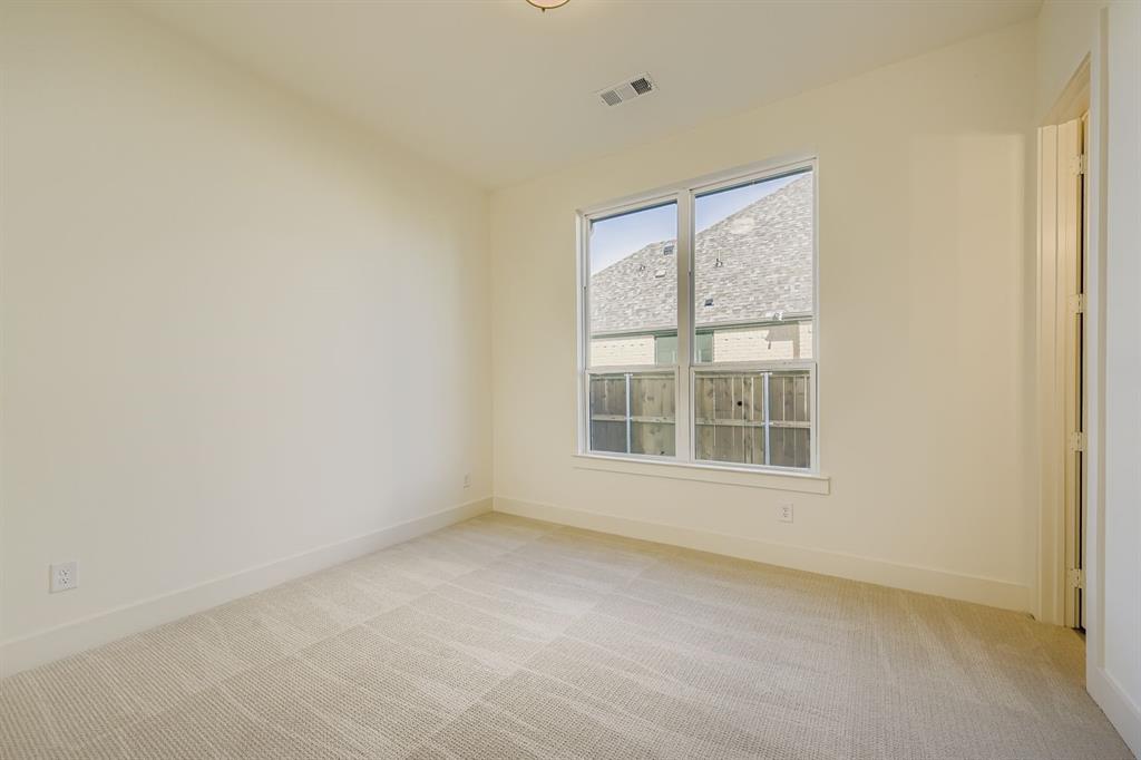 1906 M3 Ranch Road Mansfield, TX 76063 - Photo 23 of 29 Spare room featuring light carpet and baseboards