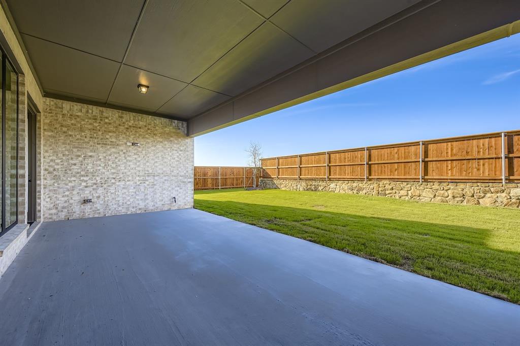 1906 M3 Ranch Road Mansfield, TX 76063 - Photo 25 of 28 a view of an empty room with a fireplace