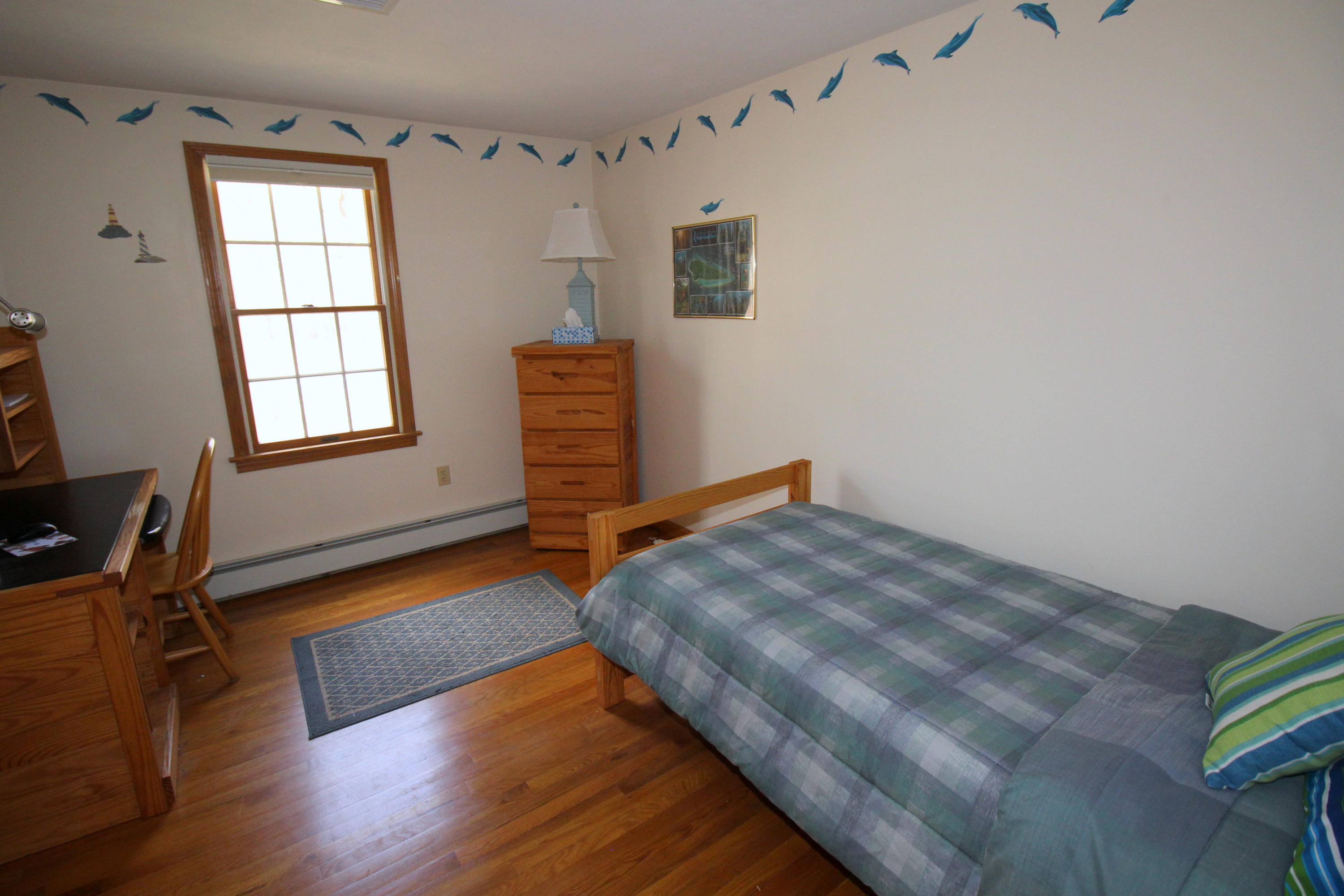 9 Gates Path Dennis, MA 02638 - Photo 13 of 20 a bedroom with bed and window
