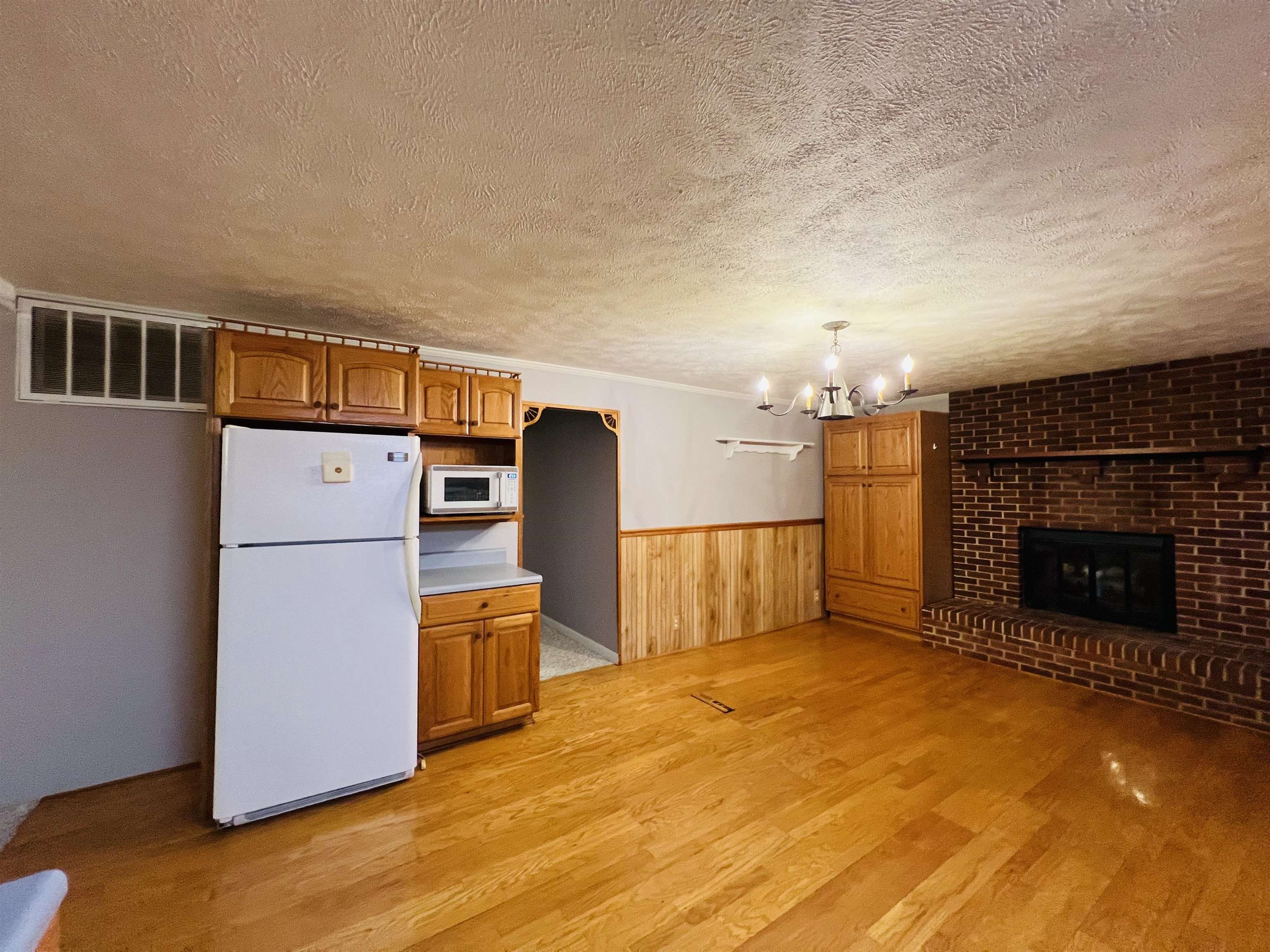 191 West Davis Street Equality, IL 62934 - Photo 13 of 21 a view of a livingroom with furniture and a fireplace