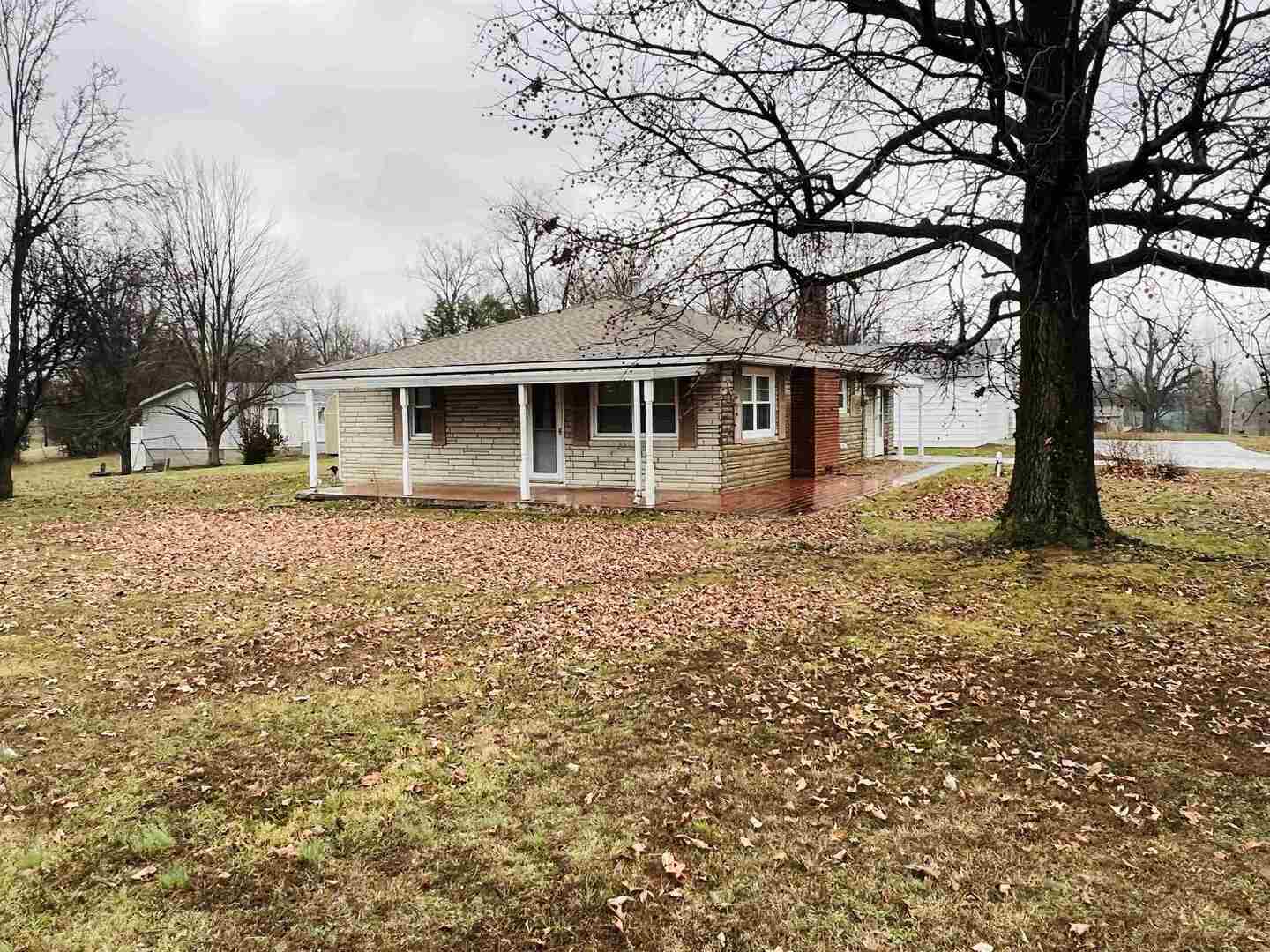 191 West Davis Street Equality, IL 62934 - Photo 5 of 21 a front view of a house with a yard