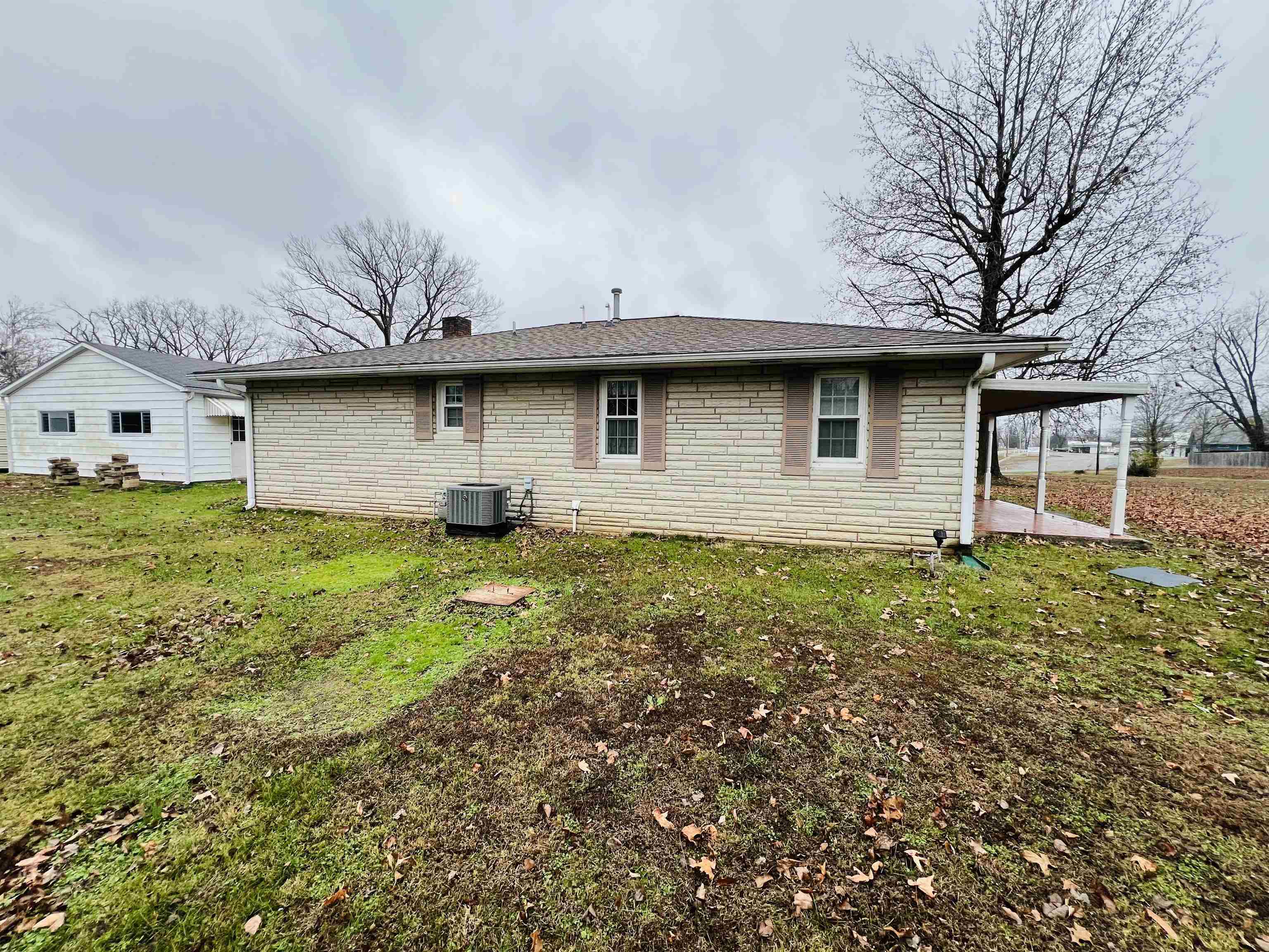 191 West Davis Street Equality, IL 62934 - Photo 8 of 21 a house view with a garden space