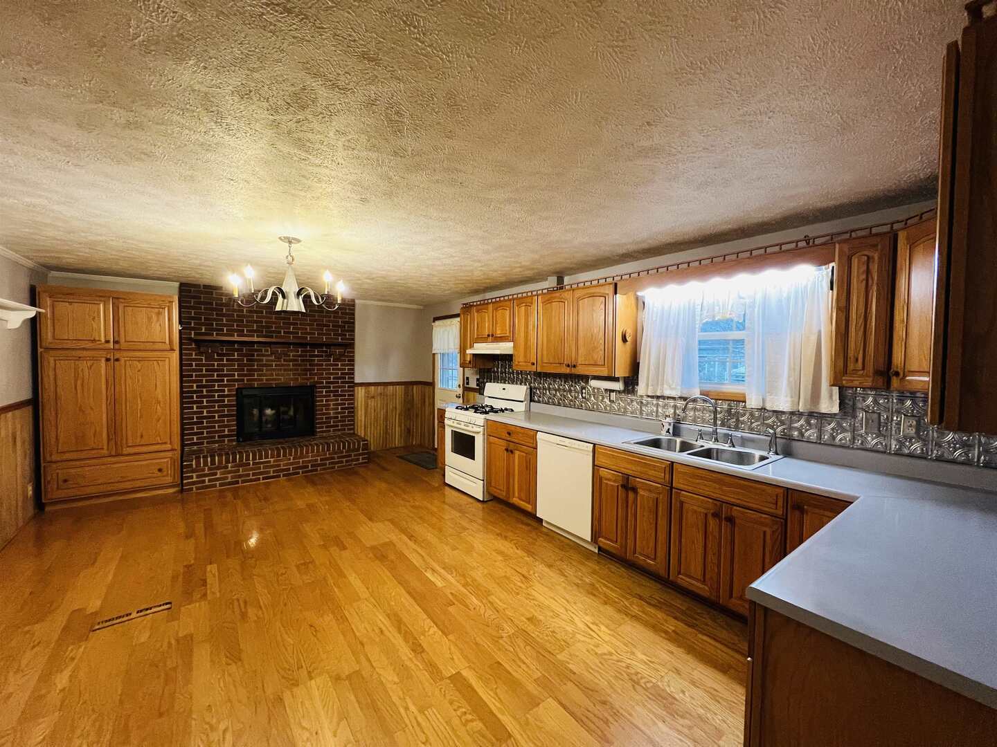 191 West Davis Street Equality, IL 62934 - Photo 10 of 21 a large kitchen with cabinets and stainless steel appliances
