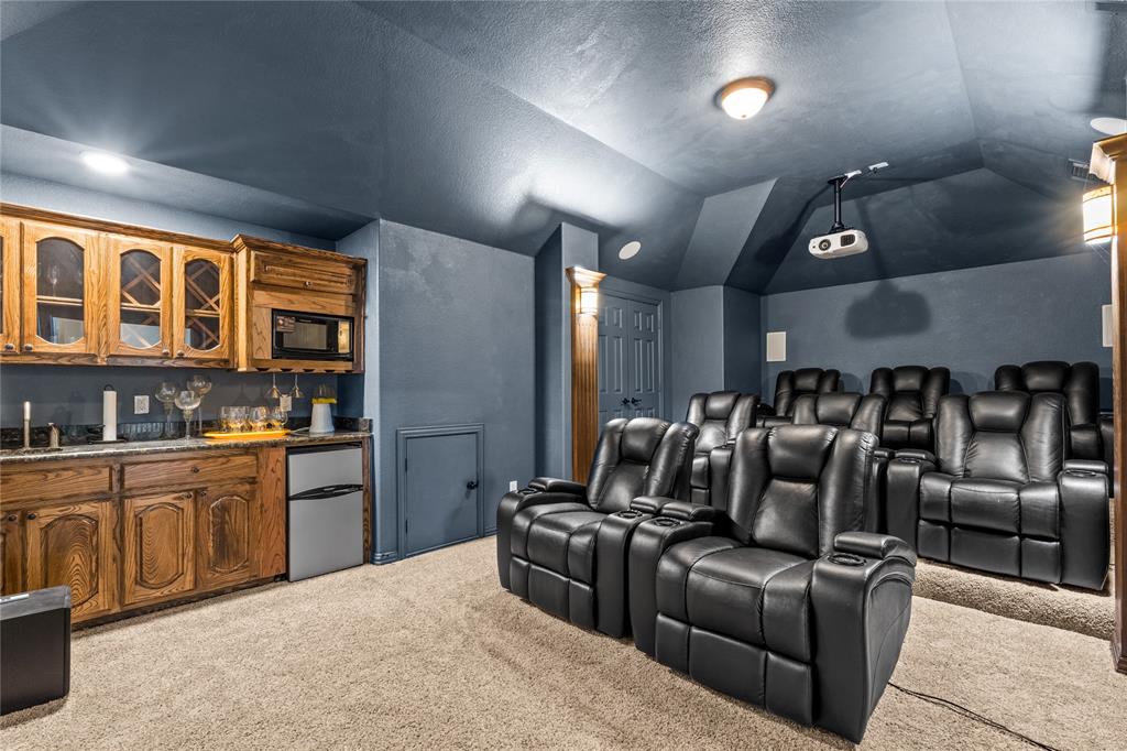 9801 Nolina Road Fort Worth, TX 76177 - Photo 22 of 40 a kitchen with stainless steel appliances granite countertop a refrigerator and cabinets