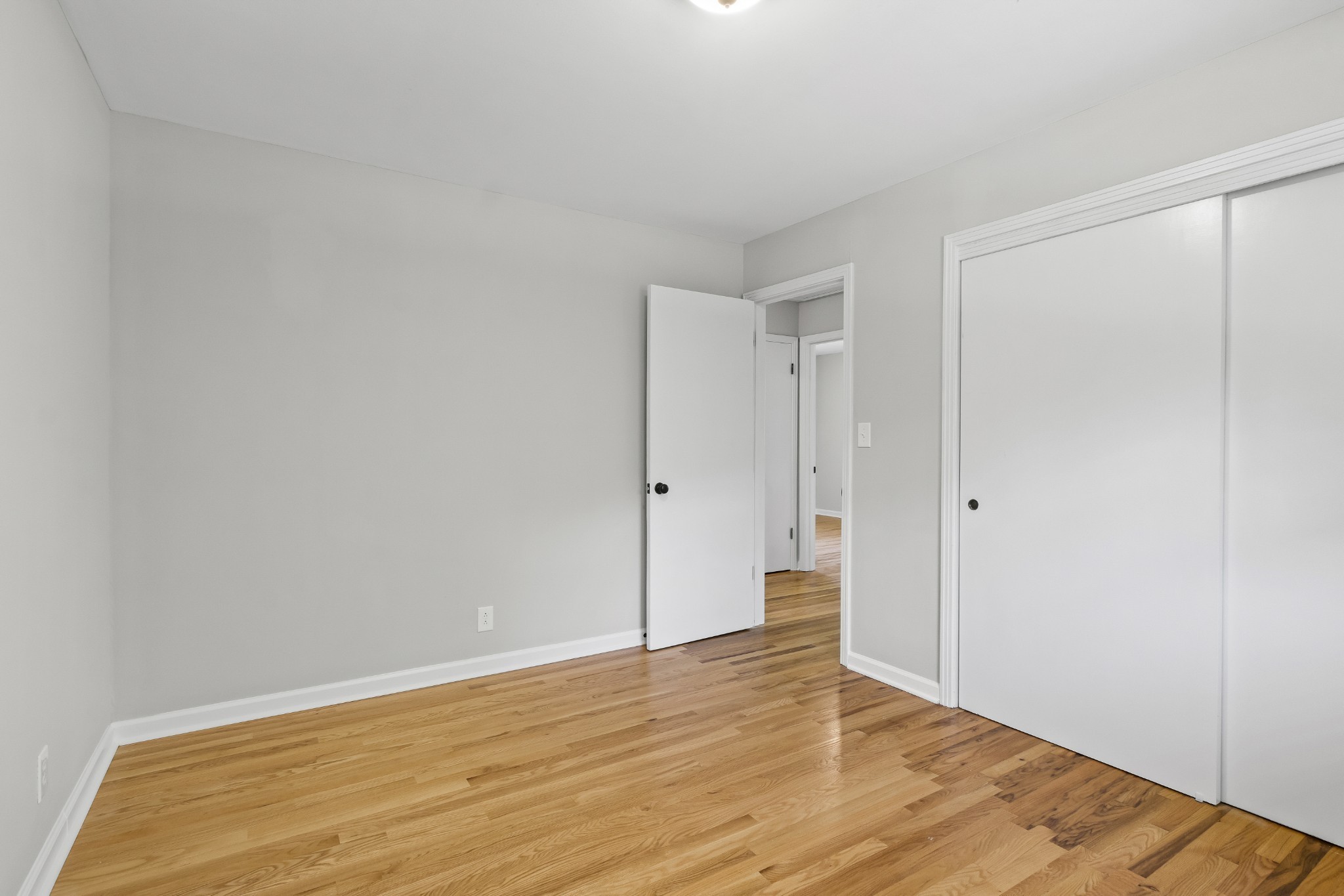 3822 Vernon Creek Road Cunningham, TN 37052 - Photo 14 of 24 a view of an empty room with wooden floor