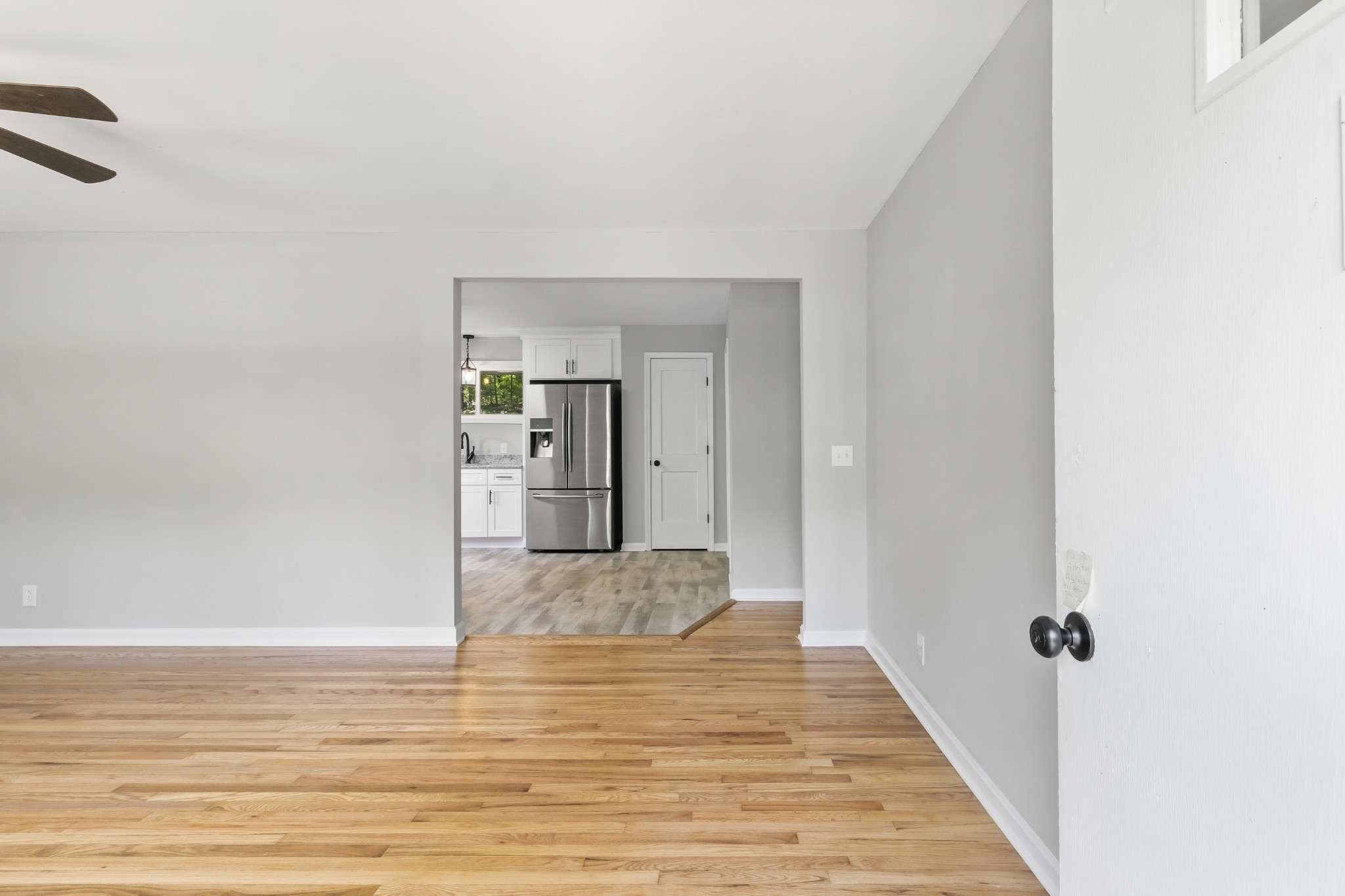 3822 Vernon Creek Road Cunningham, TN 37052 - Photo 4 of 24 a view of a hallway with wooden floor and staircase