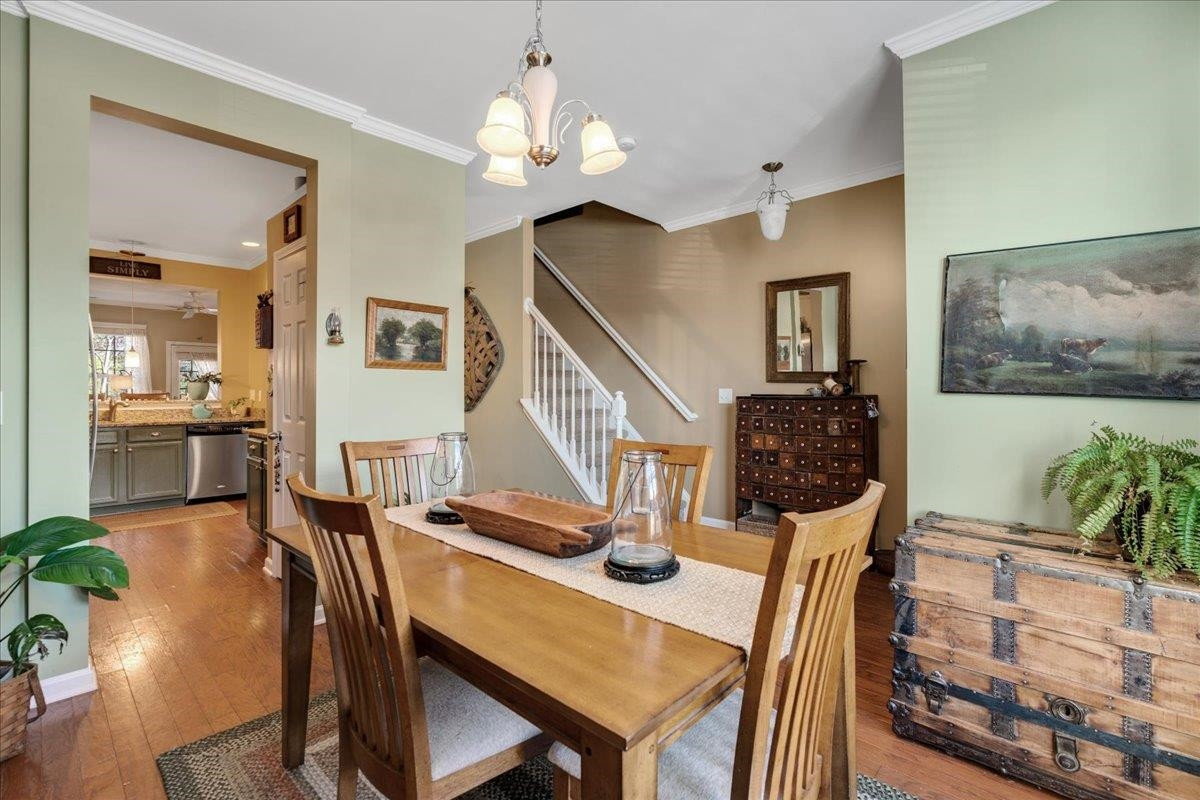 2924 Casona Way Raleigh, NC 27616 - Photo 3 of 21 a view of a dining room with furniture and wooden floor
