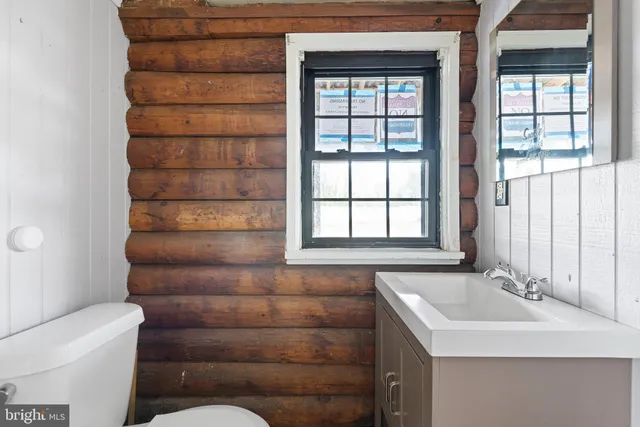 a bathroom with a sink and a toilet