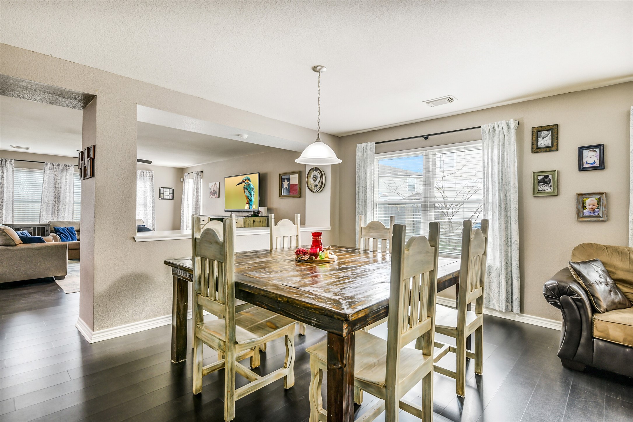 6407 Misty Brook Bend Court Spring, TX 77379 - Photo 5 of 15 a view of a dining room with furniture window and wooden floor