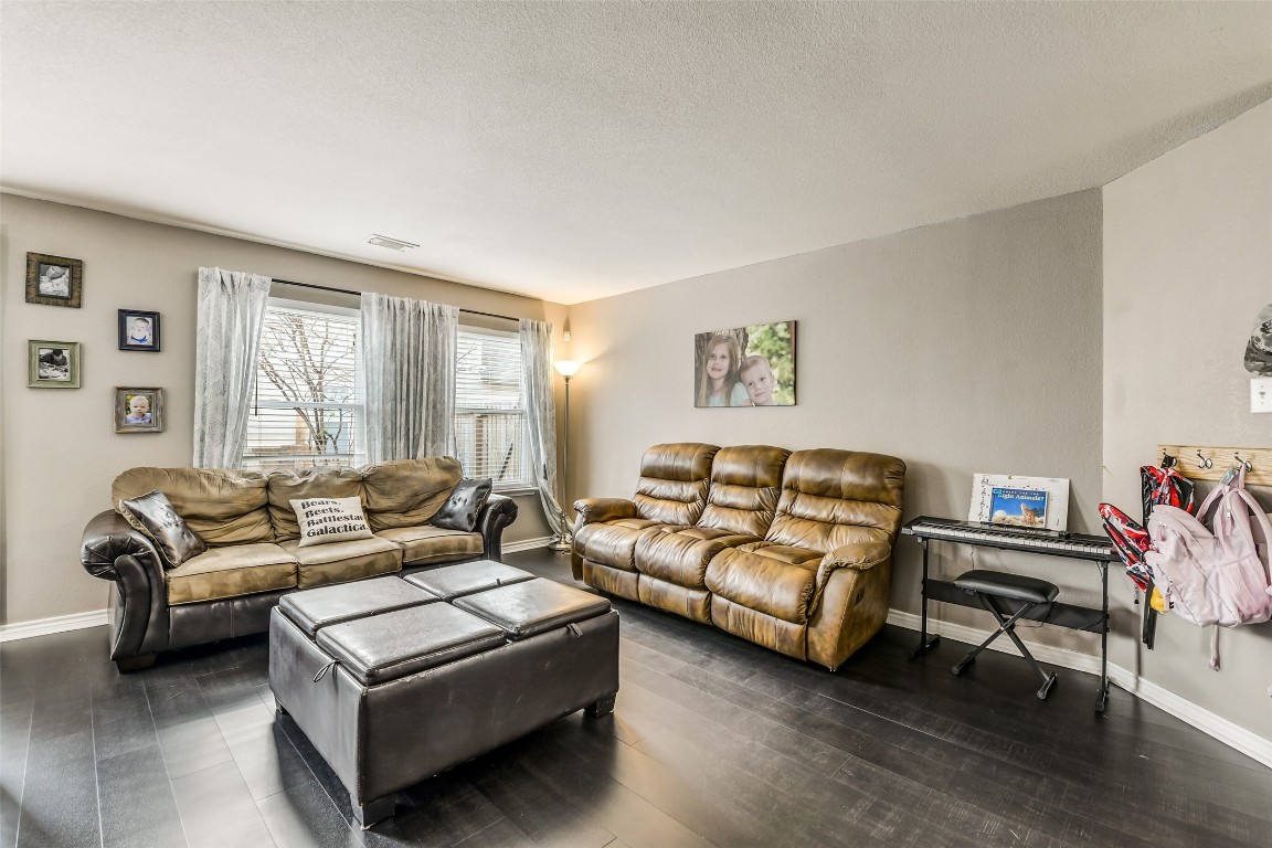 6407 Misty Brook Bend Court Spring, TX 77379 - Photo 6 of 15 a living room with furniture and a window