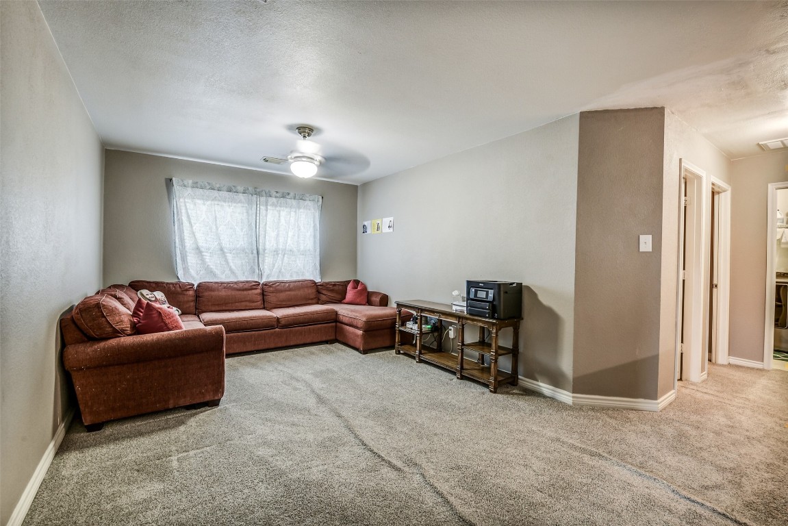6407 Misty Brook Bend Court Spring, TX 77379 - Photo 9 of 15 a living room with furniture and a window