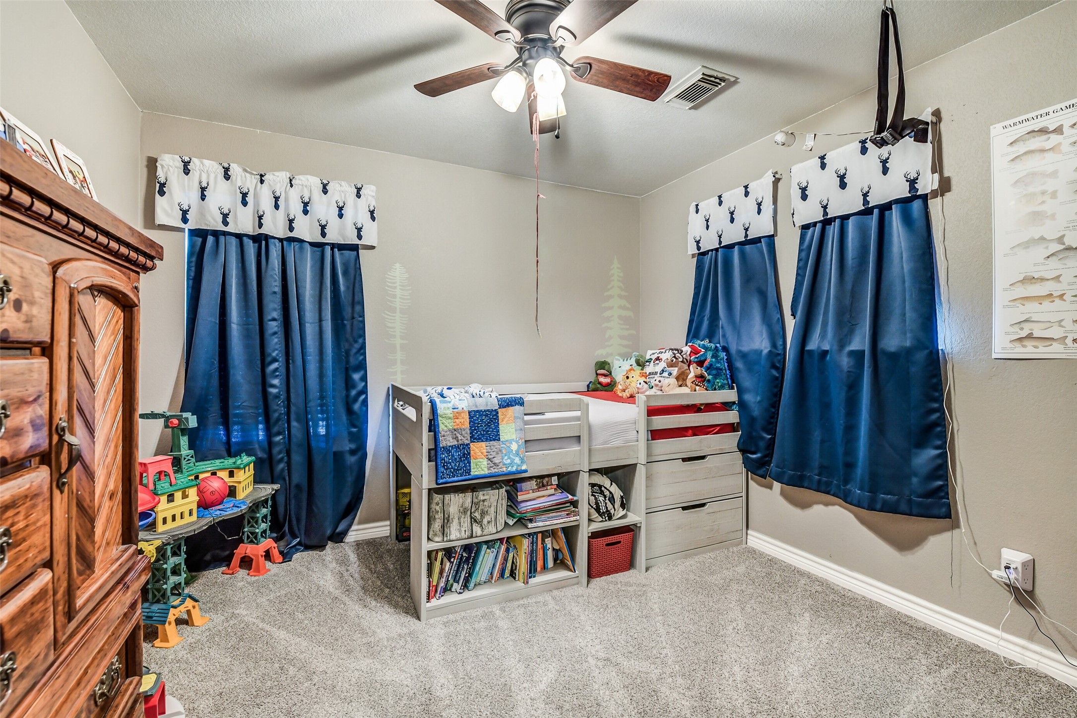 6407 Misty Brook Bend Court Spring, TX 77379 - Photo 10 of 15 a room with furniture a chandelier and a window