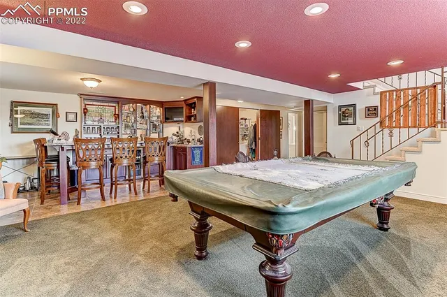 a room with lots of furniture and rug