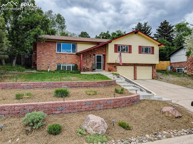 a view of house with outdoor space