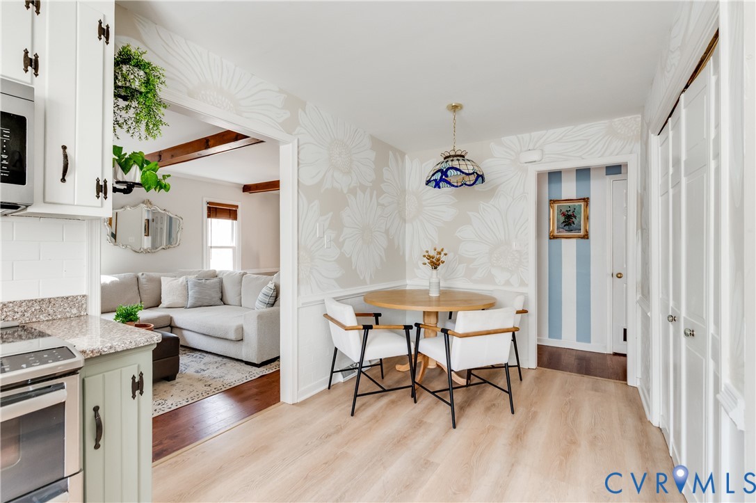 1318 Unison Drive Midlothian, VA 23113 - Photo 19 of 47 a dining room with furniture and wooden floor