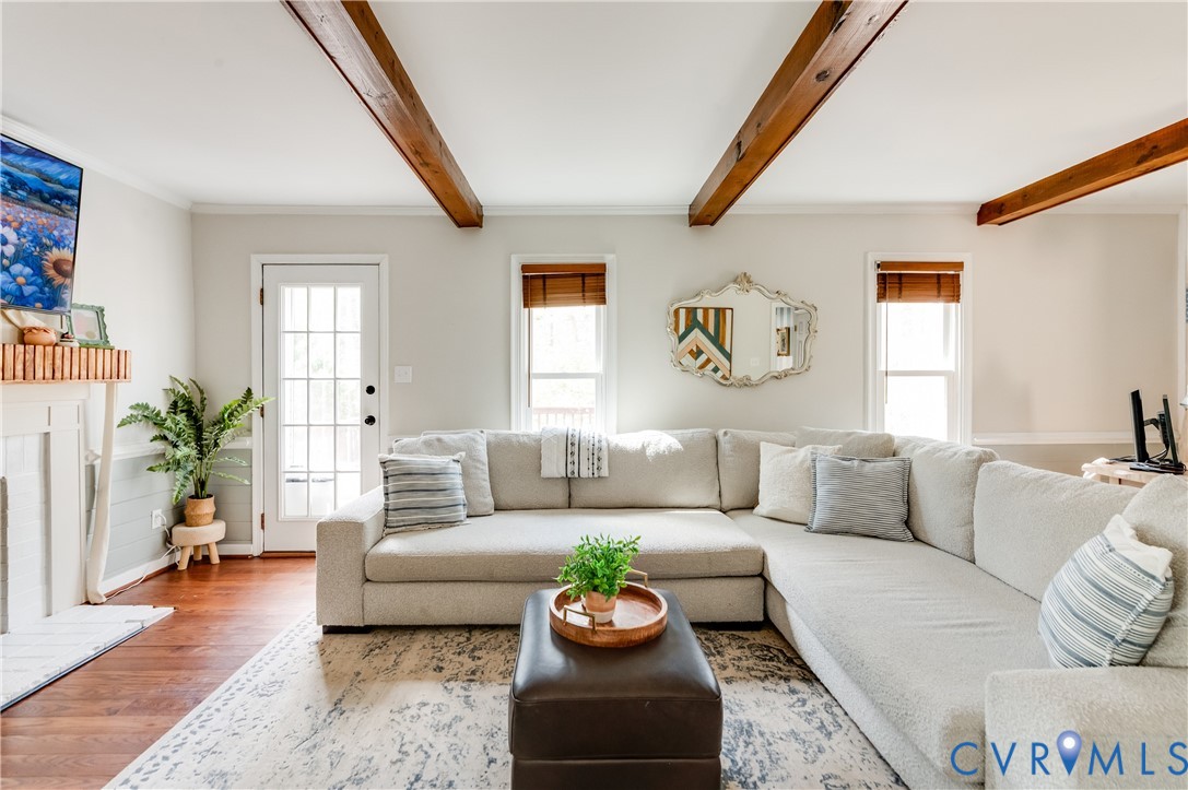 1318 Unison Drive Midlothian, VA 23113 - Photo 29 of 47 a living room with furniture potted plant and a window