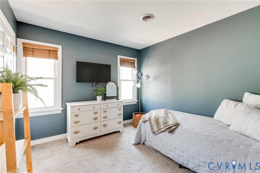 1318 Unison Drive Midlothian, VA 23113 - Photo 31 of 47 a bedroom with a bed and a flat screen tv