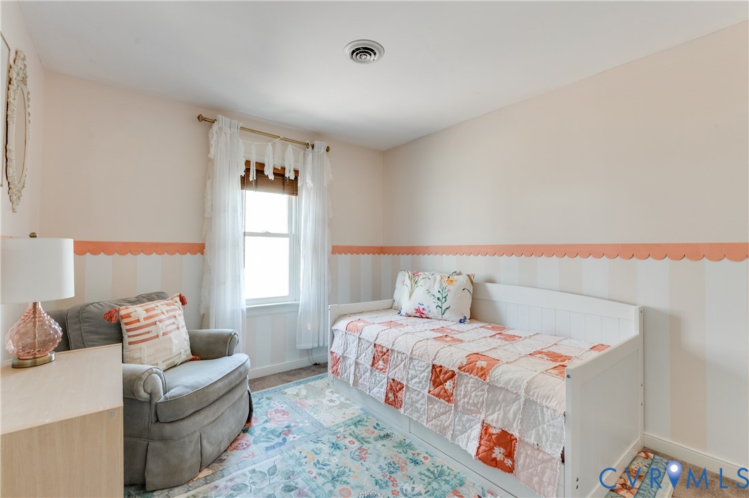 1318 Unison Drive Midlothian, VA 23113 - Photo 34 of 47 a bedroom with a bed and a couch