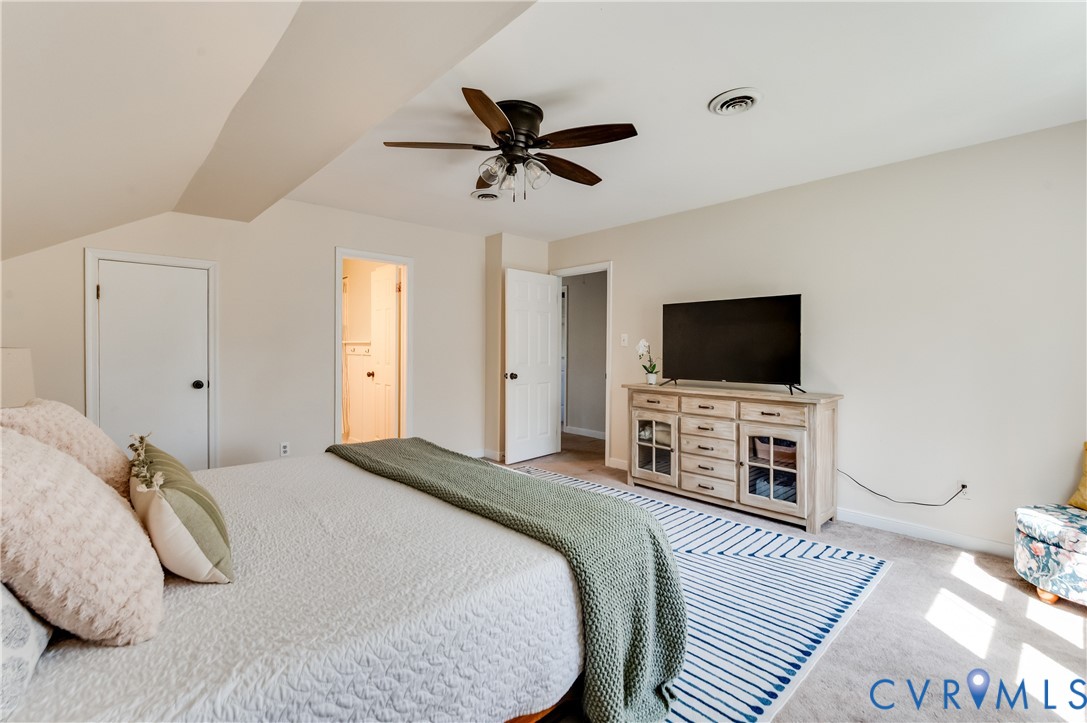 1318 Unison Drive Midlothian, VA 23113 - Photo 36 of 47 a bedroom with a bed and a flat screen tv