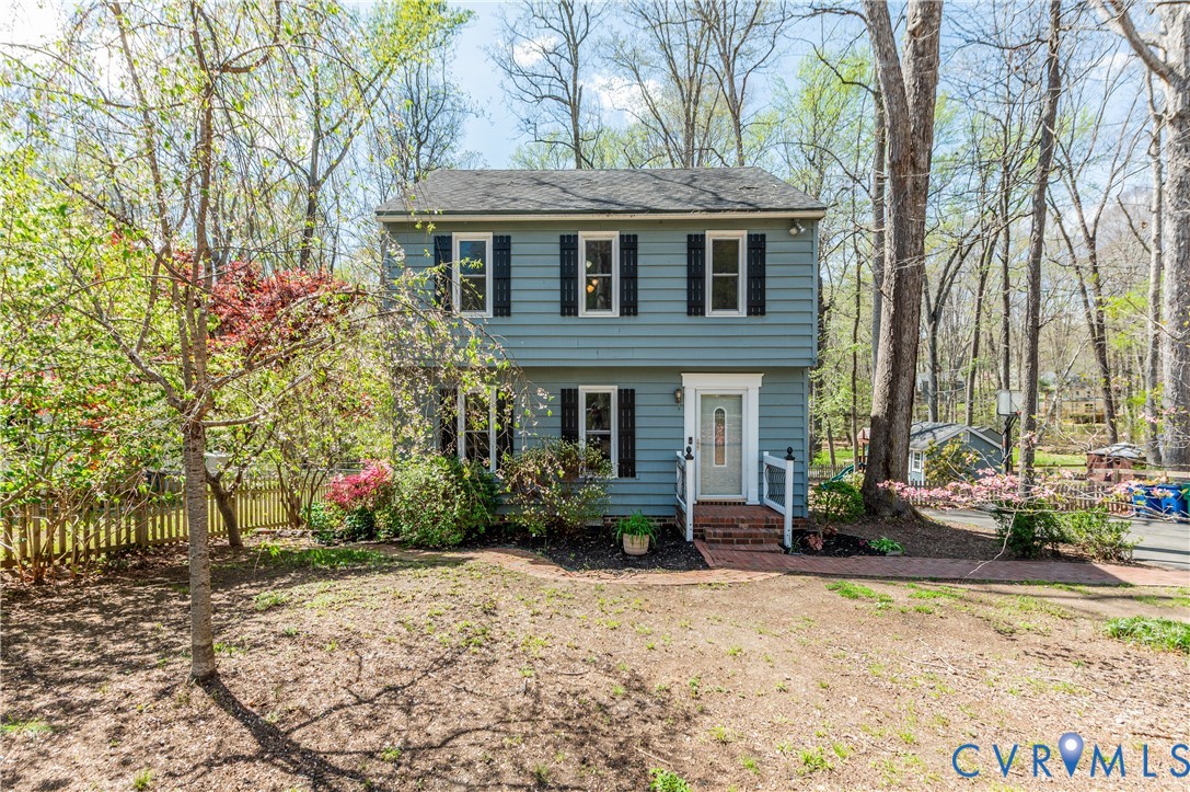 1318 Unison Drive Midlothian, VA 23113 - Photo 5 of 47 a front view of a house with garden