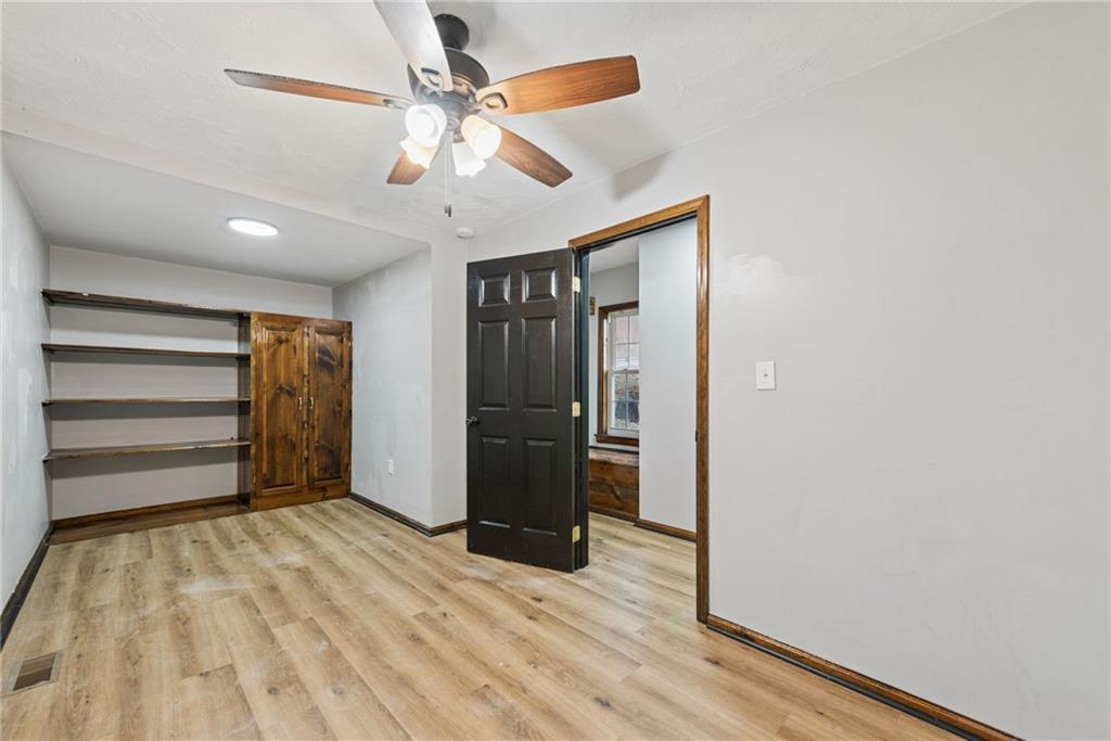 330 Braeburn Road Lower Burrell, PA 15068 - Photo 23 of 31 a view of empty room with wooden floor