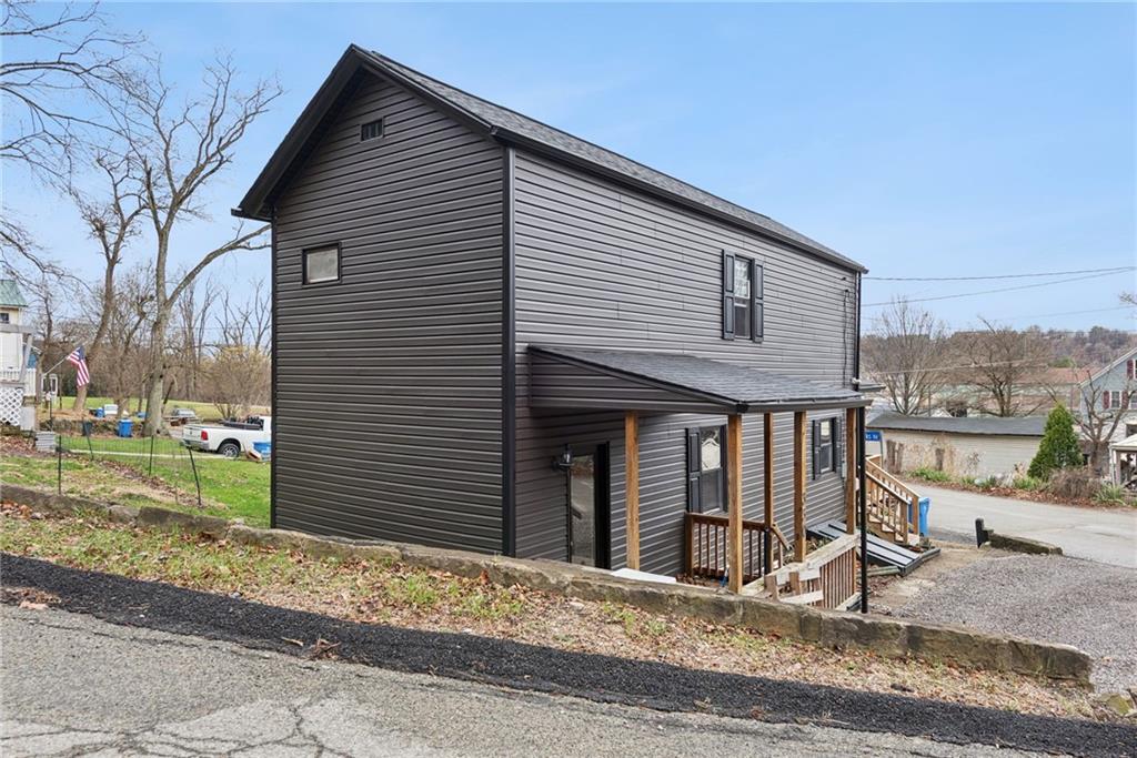 330 Braeburn Road Lower Burrell, PA 15068 - Photo 27 of 31 a front view of a house with a yard