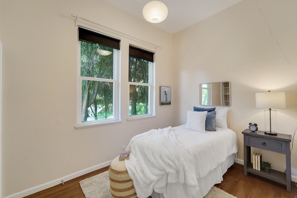 1022 Chestnut Street Oakland, CA 94607 - Photo 11 of 60 a bedroom with a bed and a window