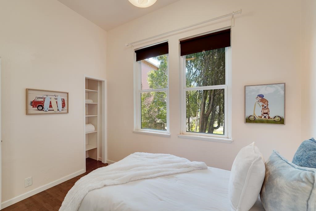 1022 Chestnut Street Oakland, CA 94607 - Photo 14 of 60 a bedroom with a bed and a window