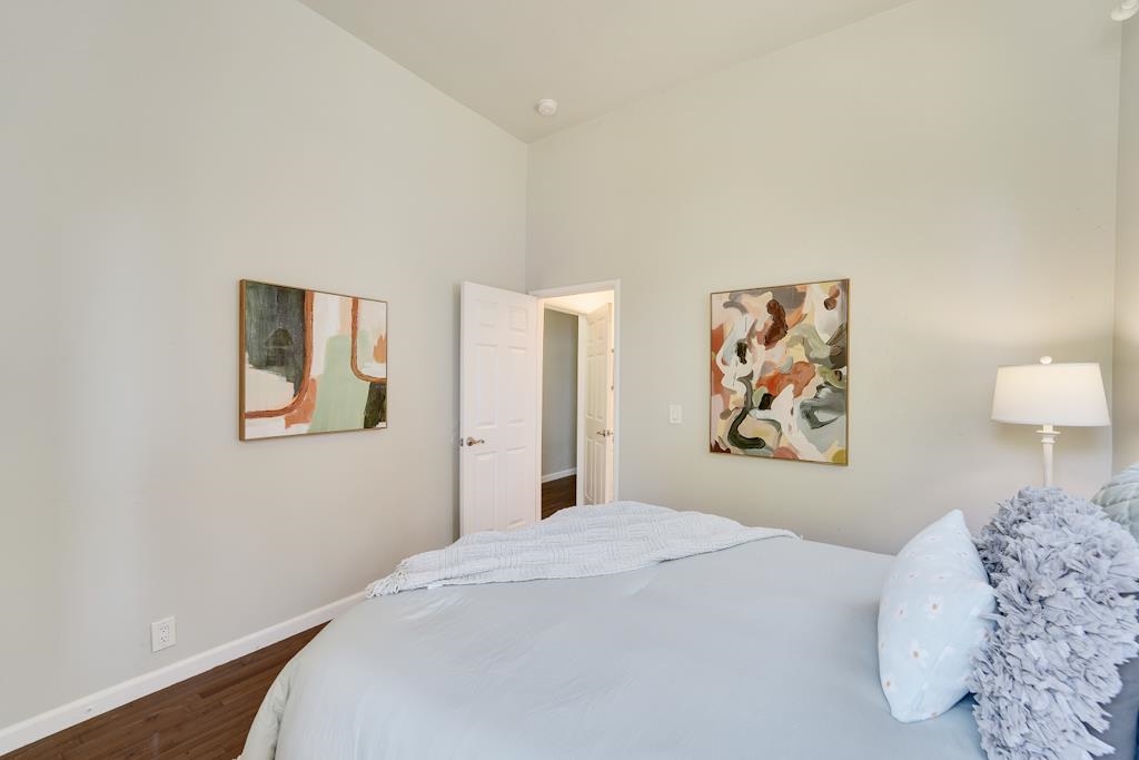 1022 Chestnut Street Oakland, CA 94607 - Photo 23 of 60 a bedroom with a bed and painting on the wall