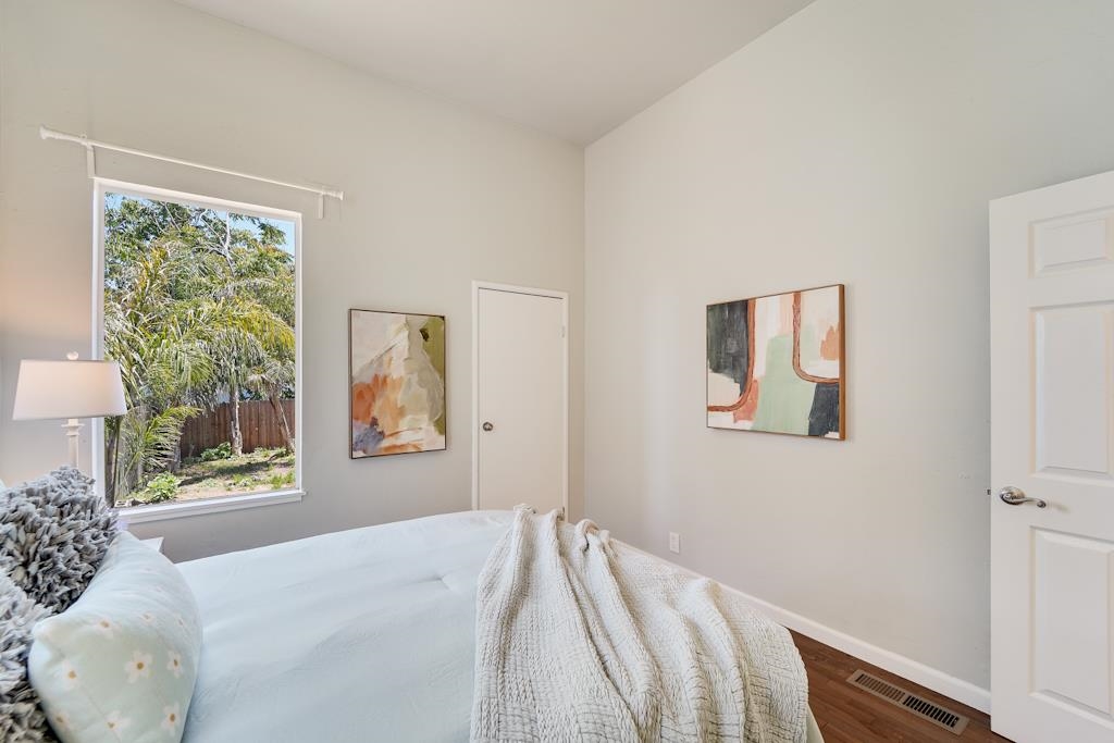 1022 Chestnut Street Oakland, CA 94607 - Photo 24 of 60 a bedroom with a bed and a window