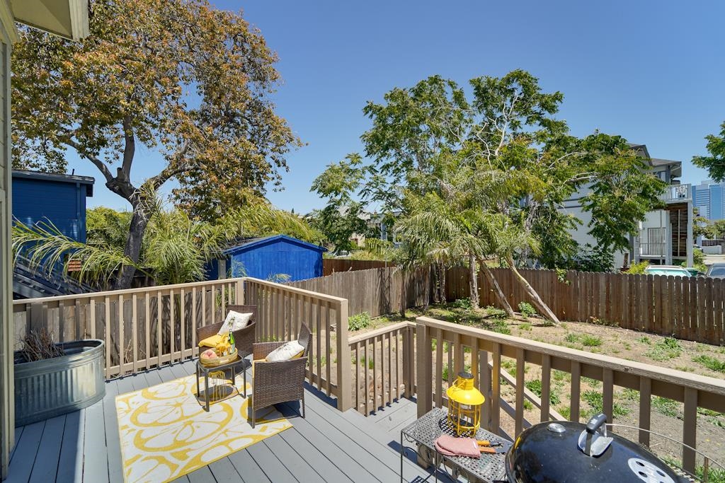 1022 Chestnut Street Oakland, CA 94607 - Photo 29 of 60 a view of deck with furniture and trees around