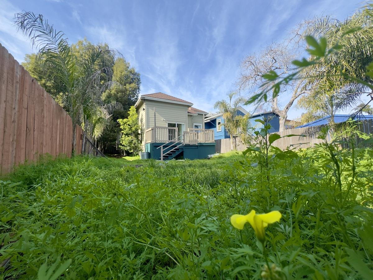 1022 Chestnut Street Oakland, CA 94607 - Photo 58 of 60 Back of property featuring a fenced backyard and a deck