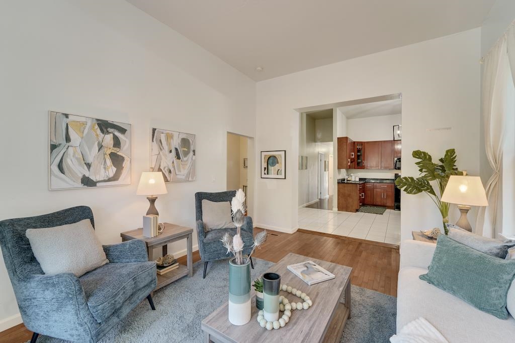 1022 Chestnut Street Oakland, CA 94607 - Photo 7 of 60 a living room with furniture and a wooden floor
