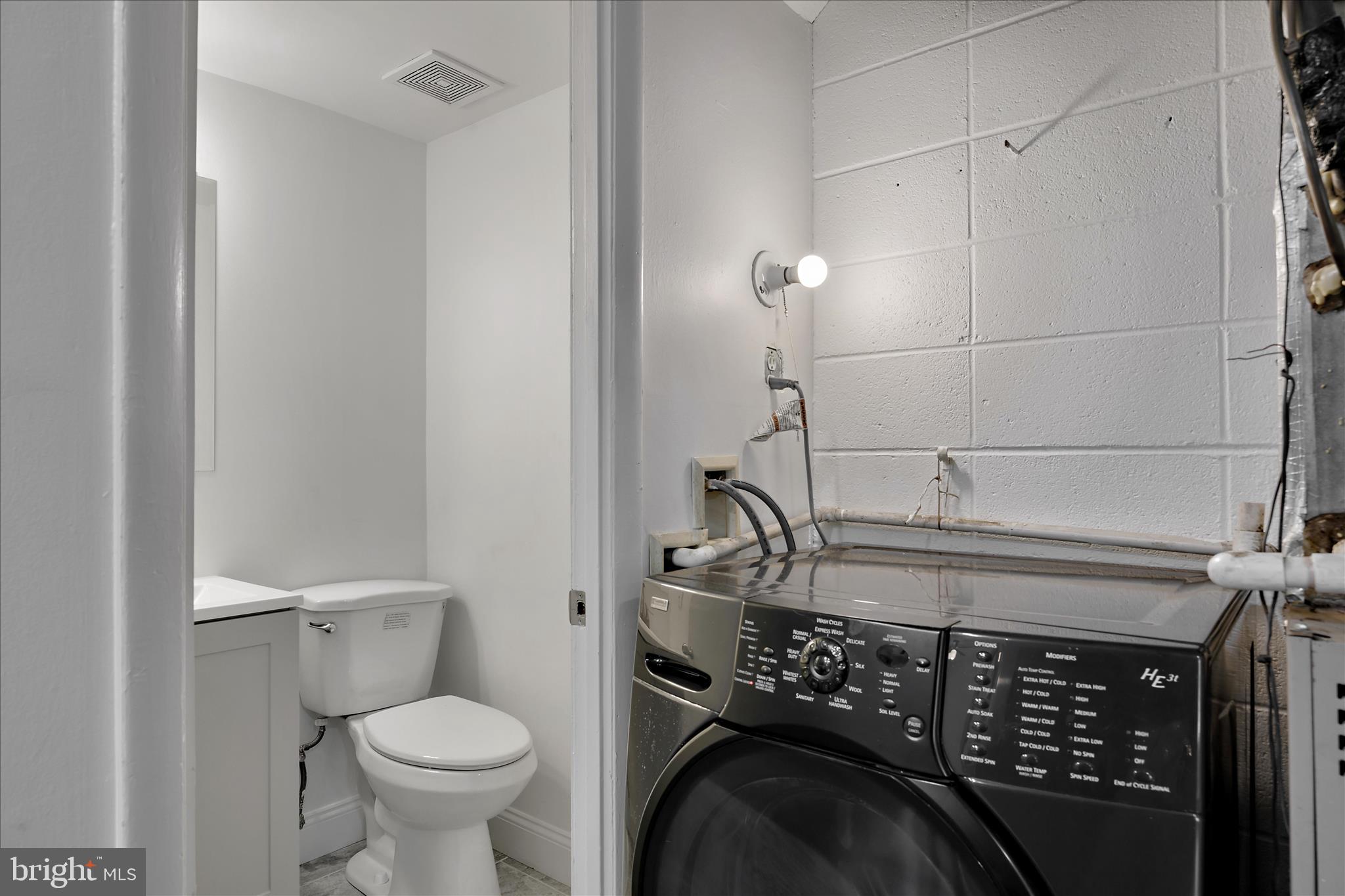 5600 Walker Mill Road Capitol Heights, MD 20743 - Photo 14 of 30 a bathroom with a sink toilet and shower