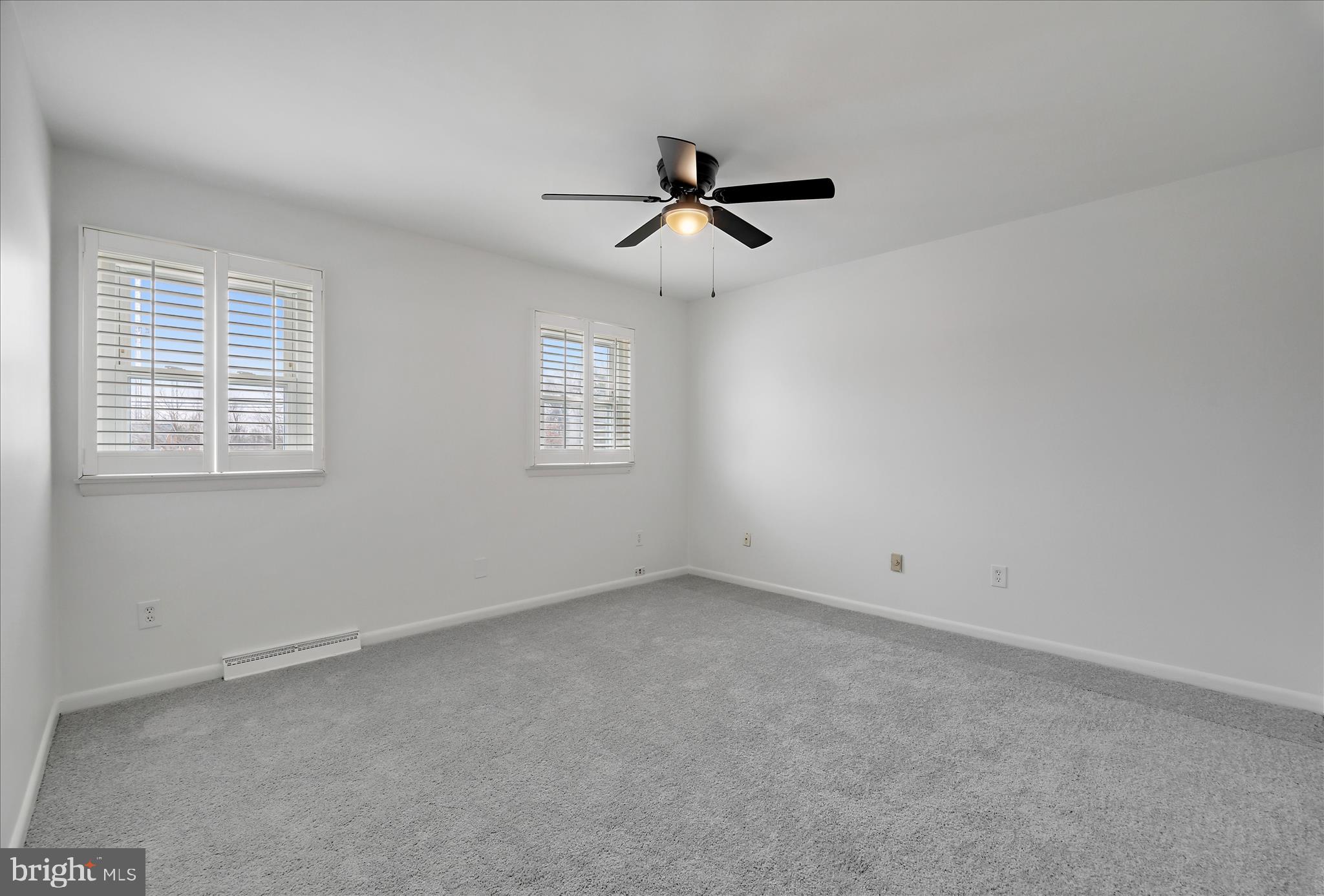 5600 Walker Mill Road Capitol Heights, MD 20743 - Photo 19 of 30 wooden floor in an empty room with a window